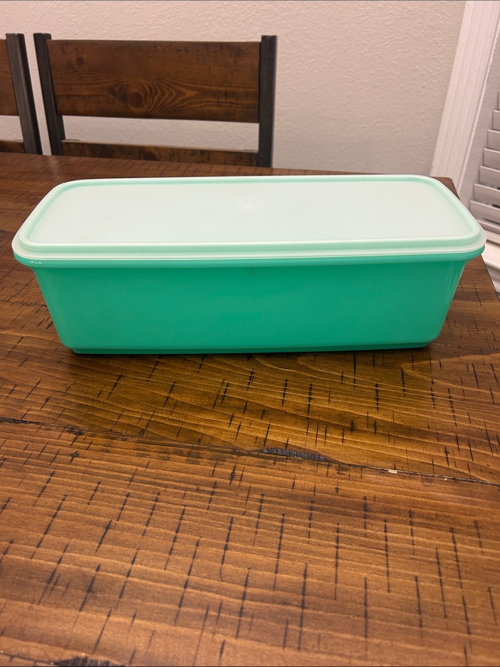 Vgt green Tupperware celery holder.